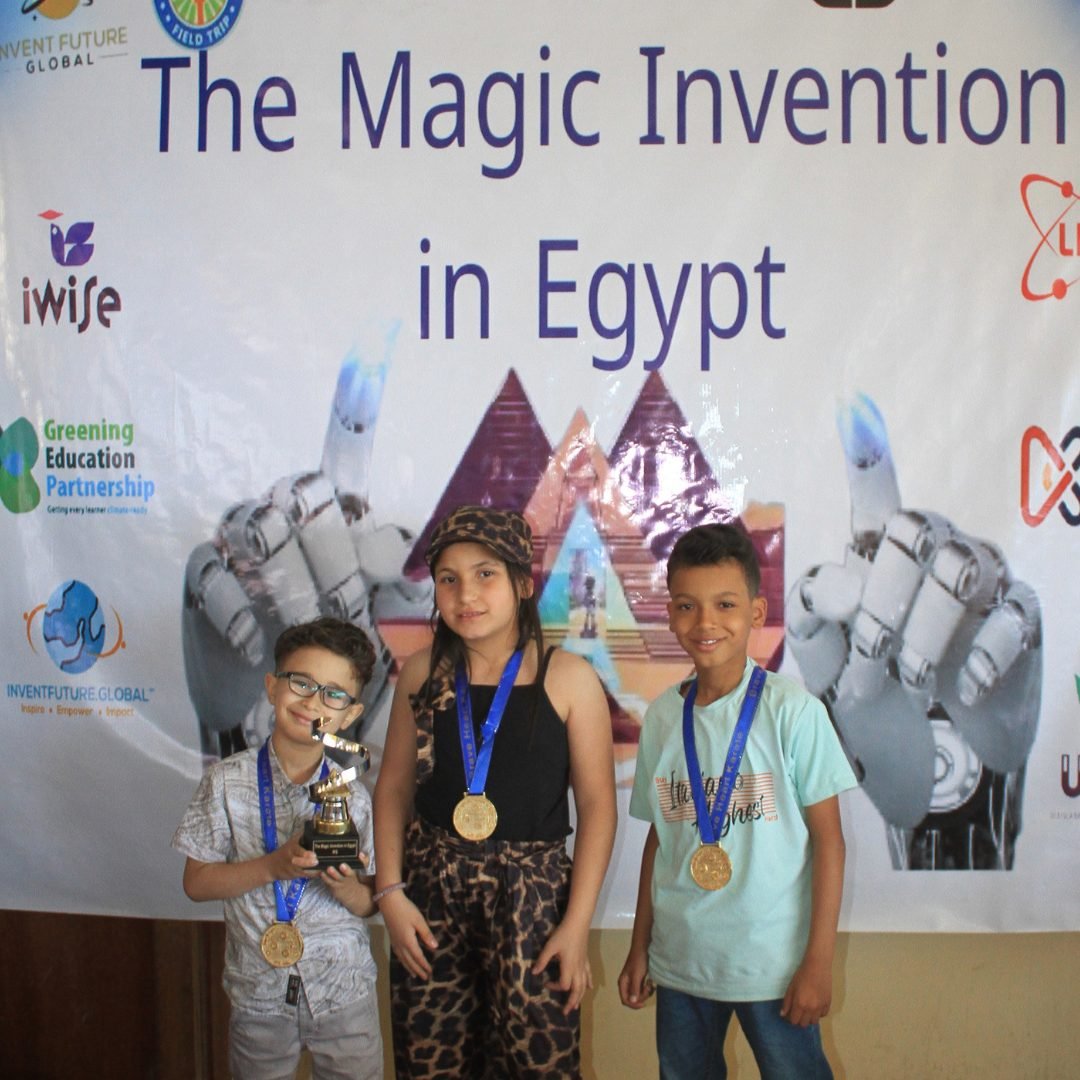 Young participants with medals and trophy