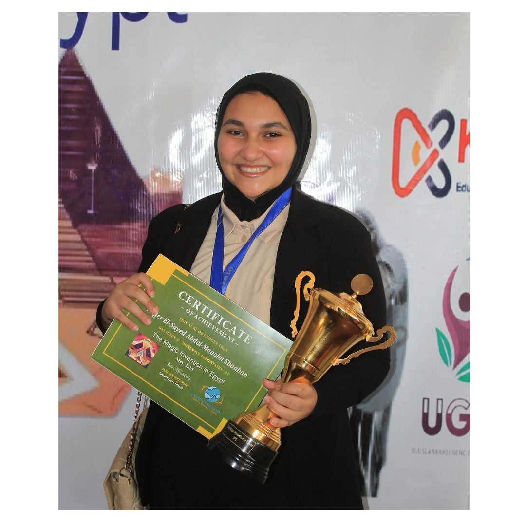 Student holding a 2026 certificate and trophy