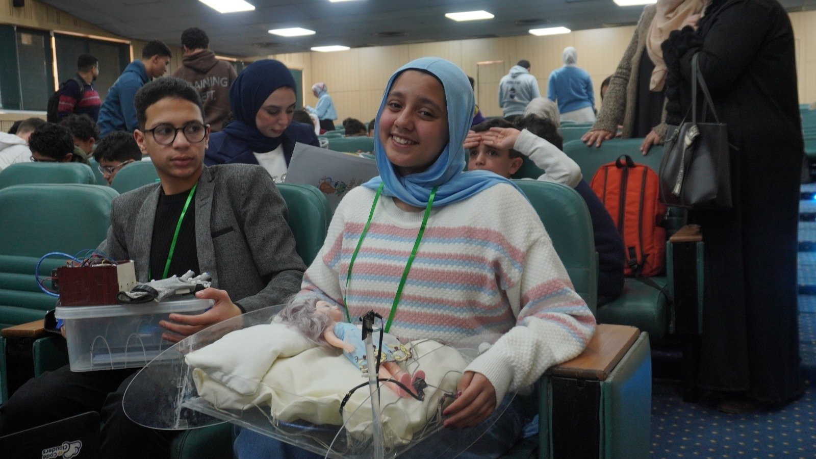 Students with a project prototype