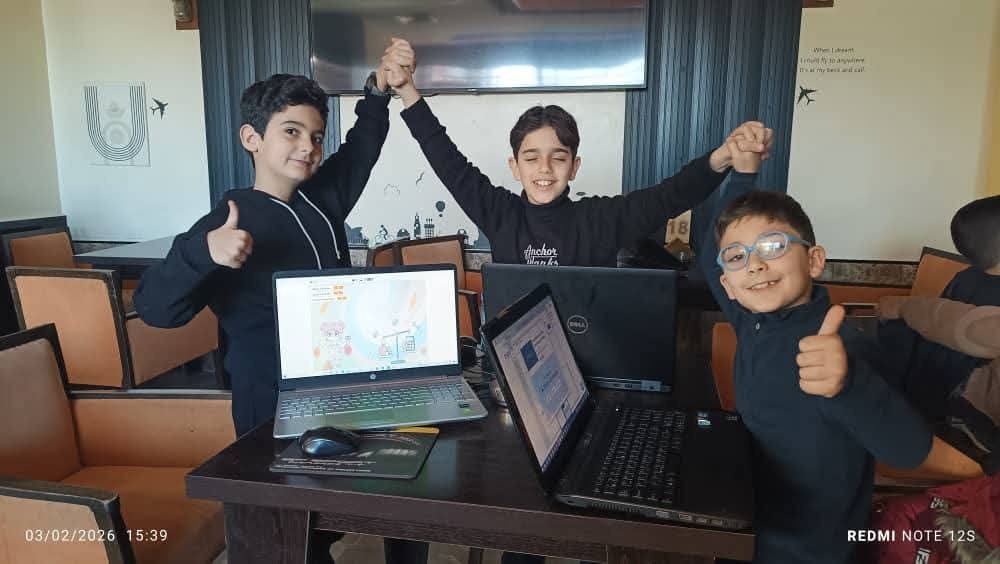 Students working together on laptops